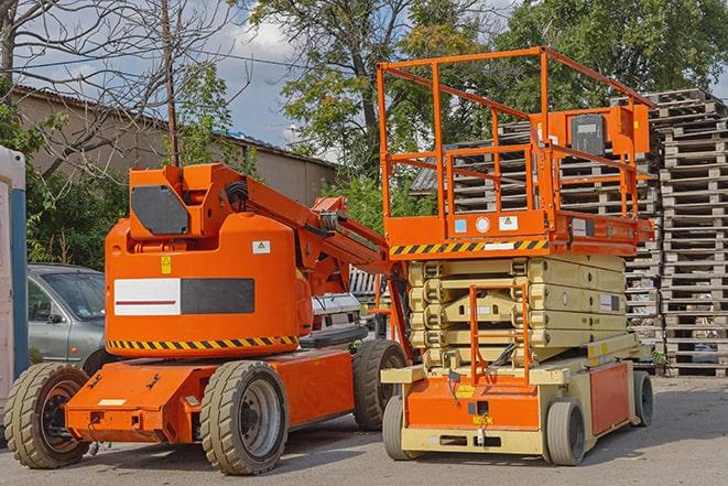 warehouse worker operating forklift to stack inventory in Fulks Run